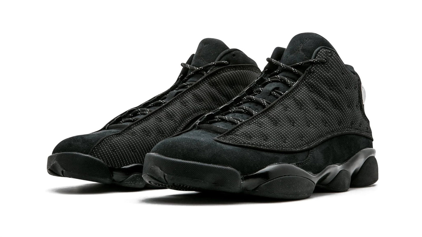 Air Jordan 13 Retro Black Cat all black sneaker side profile view